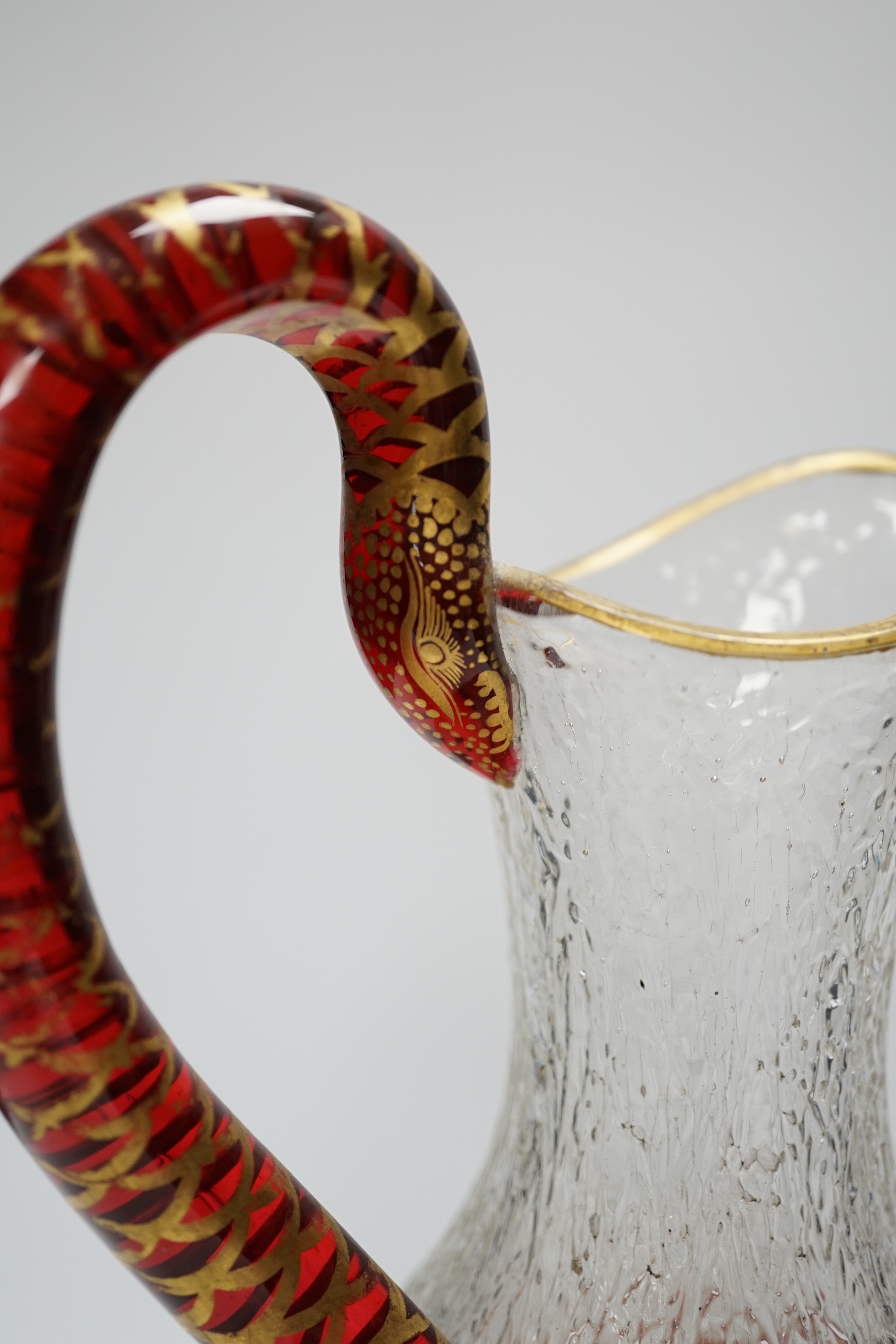 A Victorian Richardson’s of Stourbridge crackleware glass snake handled champagne ewer, 35cm high